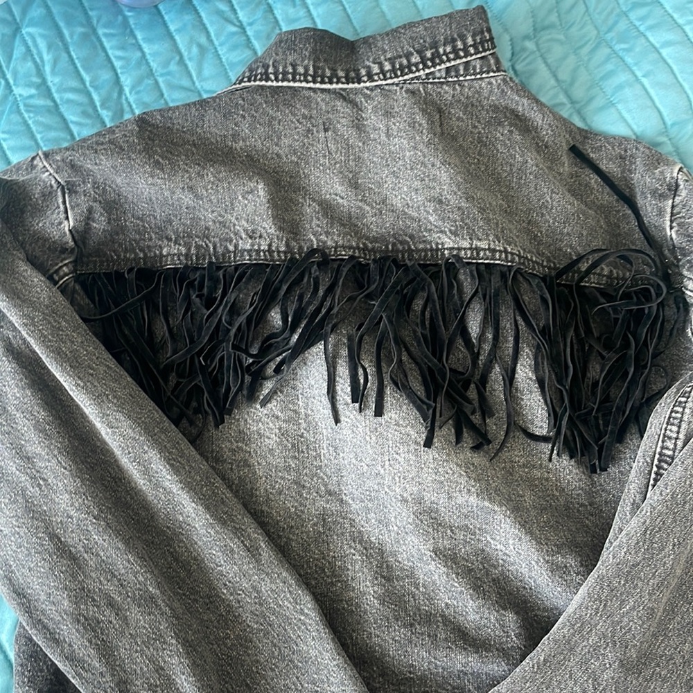 Cropped black jean jacket with black fringe